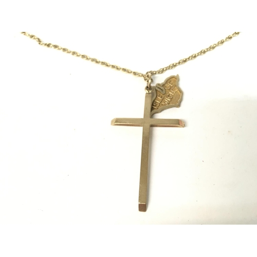 869 - 9ct gold cross on a chain with an Isle of Wight pendant attached. 13.21g total weight