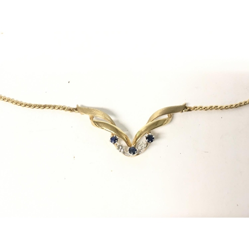 874 - 9ct gold necklace with diamonds and sapphires. 6.11g.