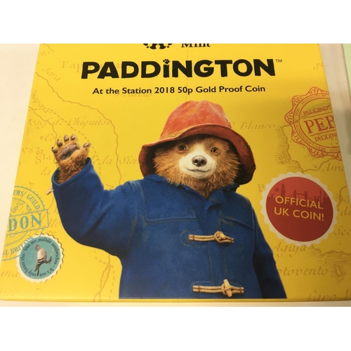 889 - A 50 p gold proof 2018 gold proof coin Paddington at the Station.