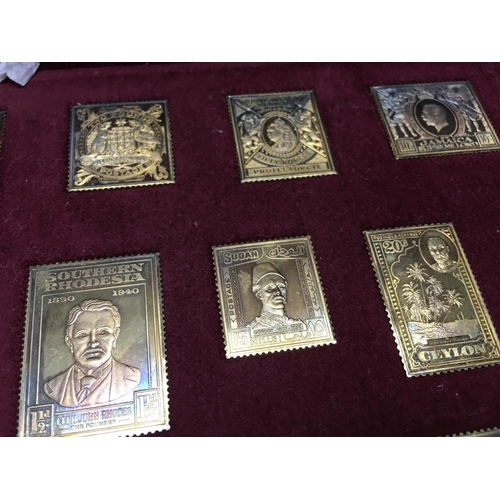 899 - A cased set of silver ingots in the form of stamps.