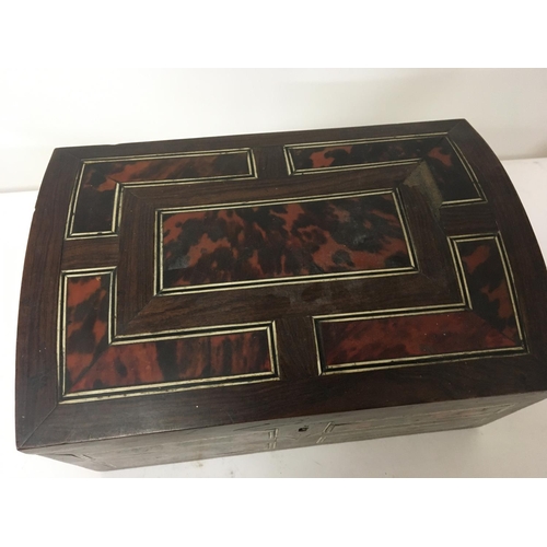 905 - A Victorian rosewood veneer and tortoiseshell work box with a well fitted interior. 30x16cm