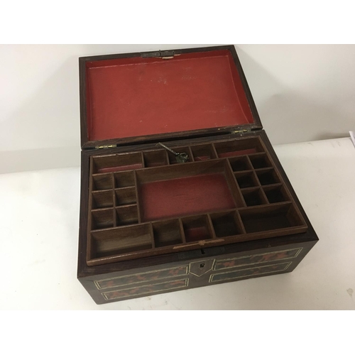 905 - A Victorian rosewood veneer and tortoiseshell work box with a well fitted interior. 30x16cm