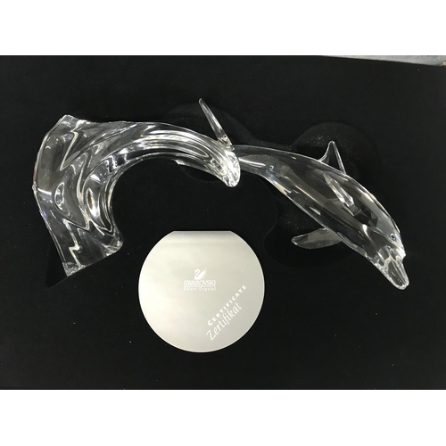 935 - A Boxed and cased Swarovski Crystal Giants Dolphin with papers