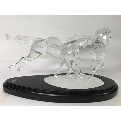 936 - A Swarovski limited edition piece The Wild Horses 05347/10000, with certificate of authenticity, pap... 