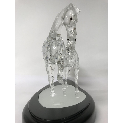 936 - A Swarovski limited edition piece The Wild Horses 05347/10000, with certificate of authenticity, pap... 