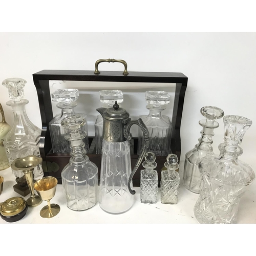 954 - Glass decanters, gas lamp, silver and bronze ornaments