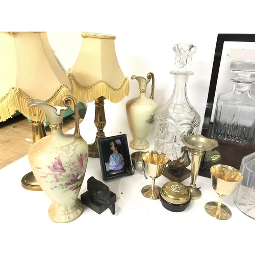 954 - Glass decanters, gas lamp, silver and bronze ornaments