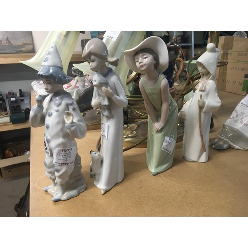 114 - Two Lladro figures and two conforming figures (4) NO RESERVE