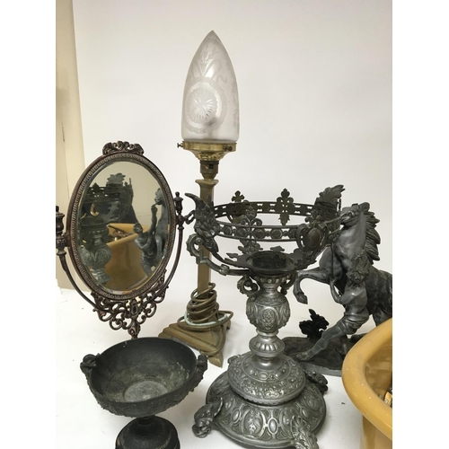 17 - A collection of metal and brassware a lamp Marley Horse mirror and a quantity of brass animals. Post... 