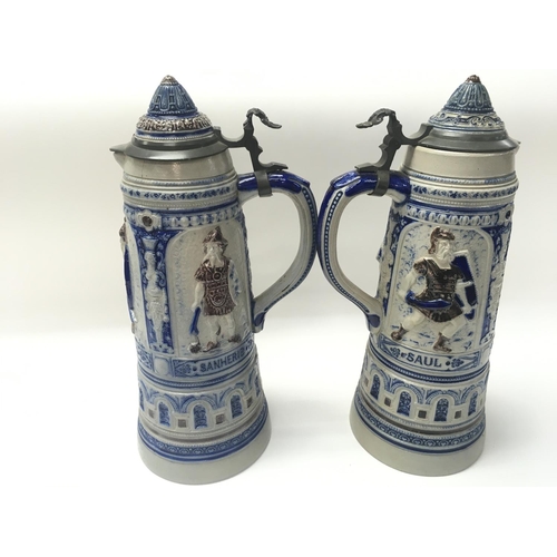 185 - A pair of German beer steins.