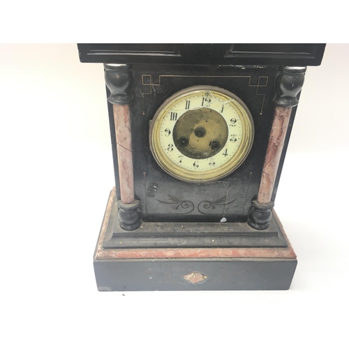 189 - A Victorian slate mantle clock in need of restoration.