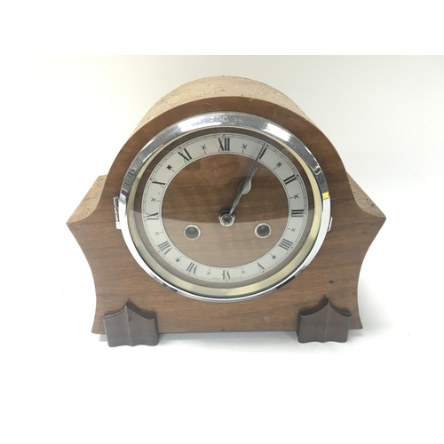 190 - An Enfield wooden mantle clock.