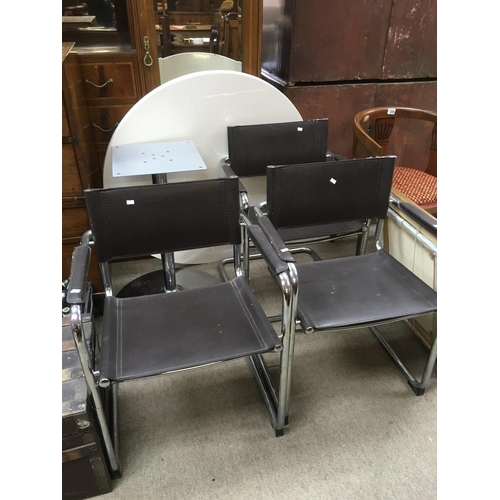 202 - No Reserve - Three tubular and leather modern design chairs and a circular dining table with chrome ... 