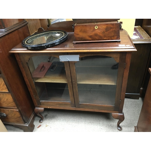 218 - An Edwardian mahogany glazed 2 door cabinet. 91 x 100 x 42cm NO RESERVE