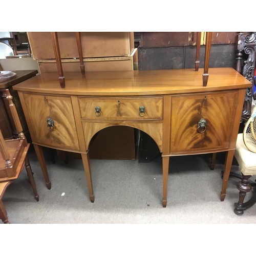 232 - An inlaid mahogany sideboard fitted with two cupboard doors either side of one drawer, approx 148cm ... 