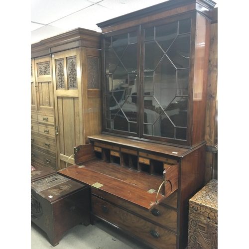 248 - A Quality George III Mahogany Secretaire bookcase the dentil moulded cornice above glazed doors abov... 