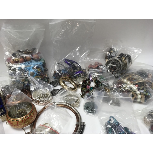 337 - Large collection of costume jewellery including multiple bags & a box of chains and pins