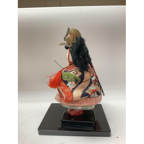 374 - Traditional Japanese doll depicting  a Onna-musha (female warrior)