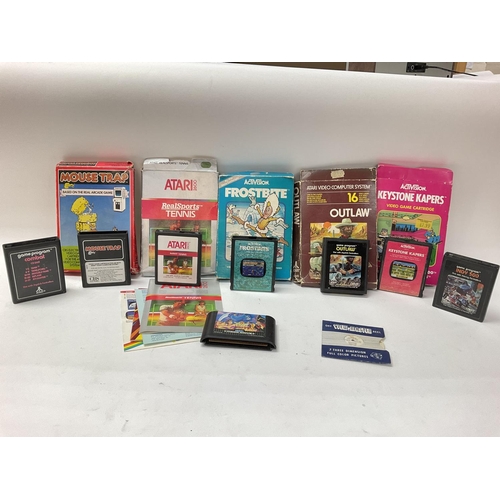 376 - Collection of vintage entertainment items including some cased games for the Atari 2600, a boxed Waf... 