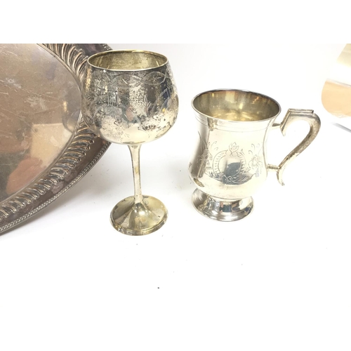 383 - Three silver coloured items including a tankard and a tray.