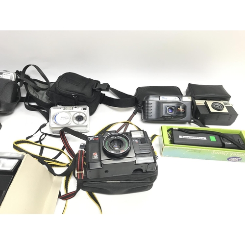 416 - A collection of assorted cameras and accessories. No reserve