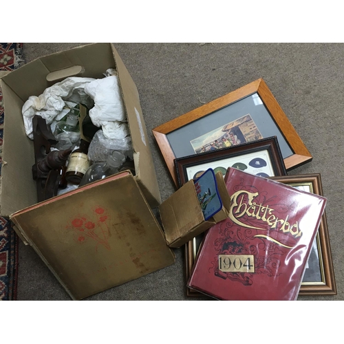 425 - A large collection of assorted items including framed pictures, porcelain figures, glass bottles etc