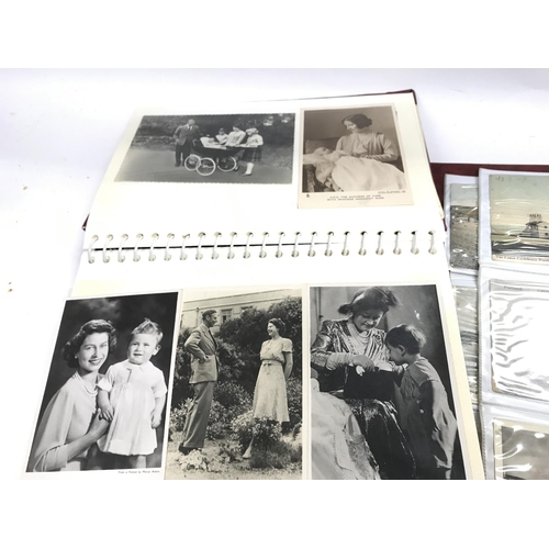 428 - A collection of vintage postcards and picture cards including a number of the royal family.