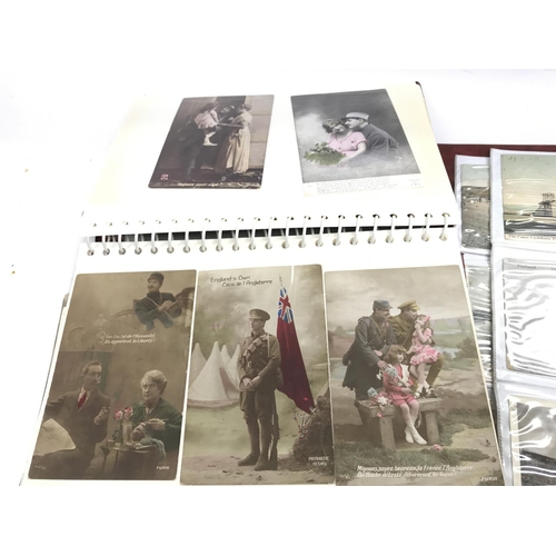 428 - A collection of vintage postcards and picture cards including a number of the royal family.