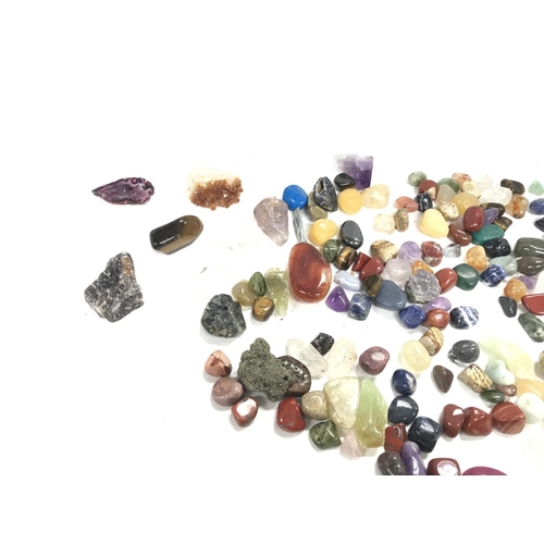 432 - A collection of various semi precious stones and crystals.