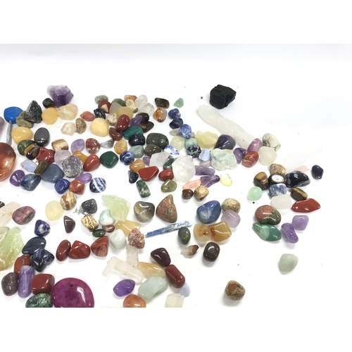 432 - A collection of various semi precious stones and crystals.