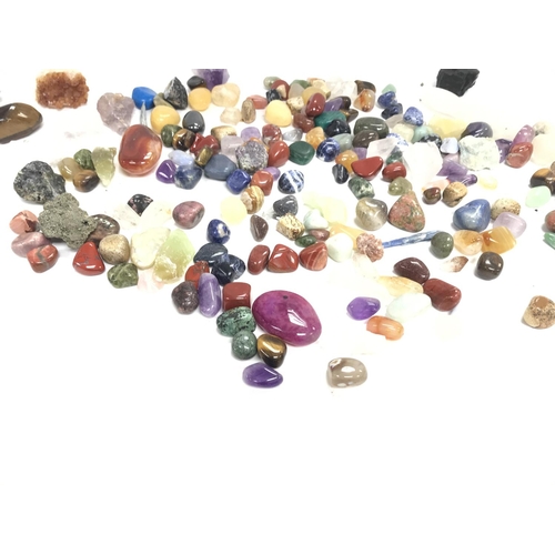 432 - A collection of various semi precious stones and crystals.