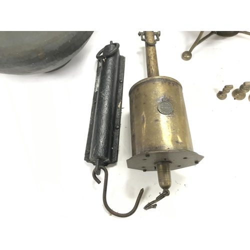 436 - A collection of predominantly brass items including bells - vase - scales etc.