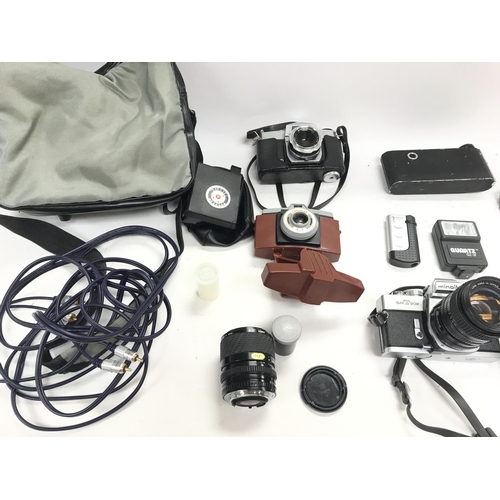 505 - A collection of various cameras and accessories.