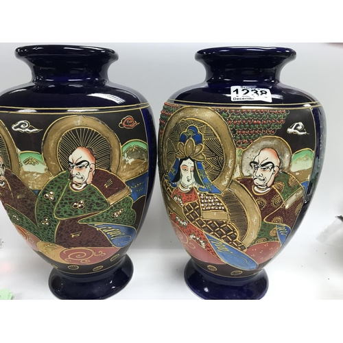 52 - A pair of Japanese satsuma vases decorated with gods .NO RESERVE