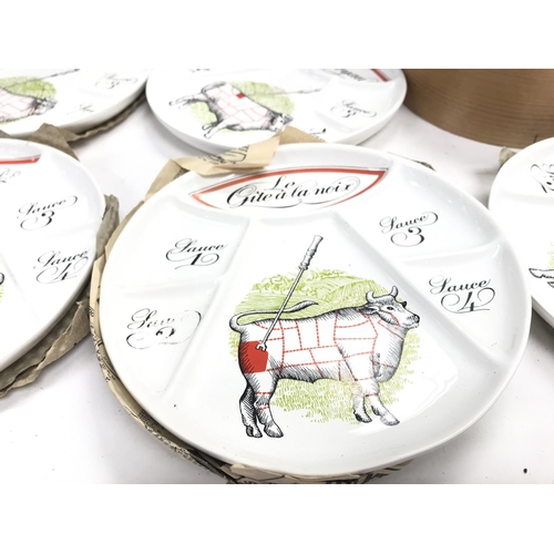 539 - A collection of French serving plates