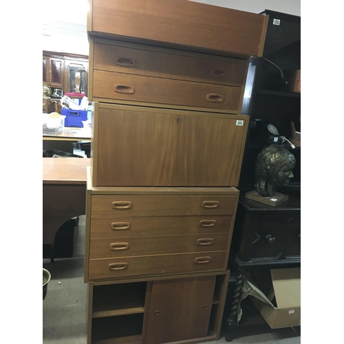 545 - A 1970s Danish  teak floating sectional wall mounted  cabinet, storage centre.