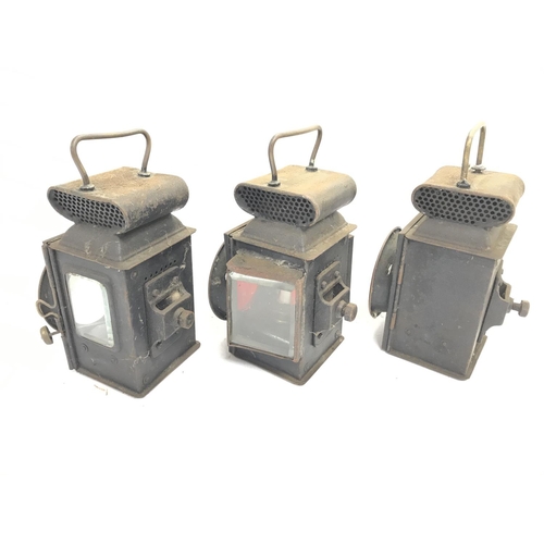 558 - Three vintage car / bicycle lamps.