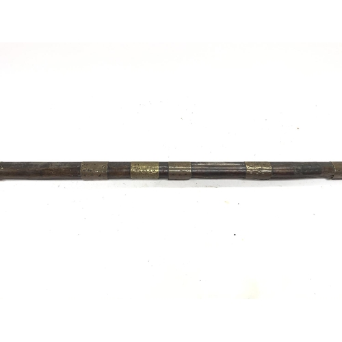 574 - An Afghan long rifle / Jezail approximately 65inches long.