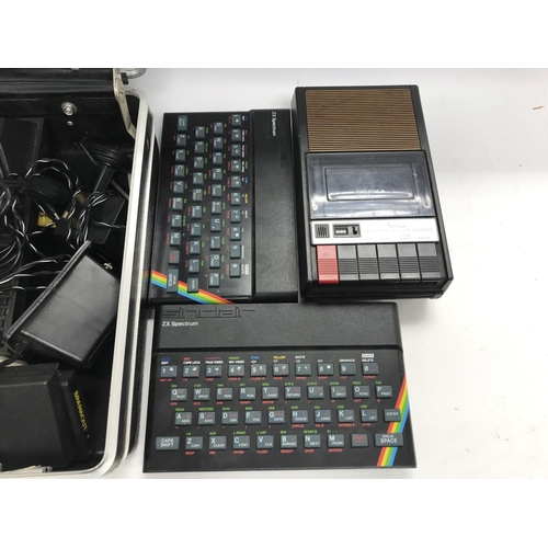 593 - Atari games consul with various accessories