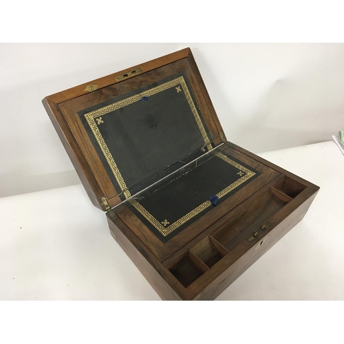 87 - No Reserve - A late Victorian brass bound walnut writing box with a fitted interior.