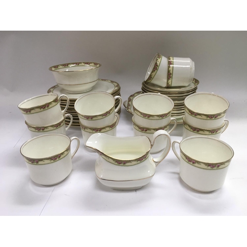 91 - An Aynsley tea set with a band of floral decoration on a white ground. NO RESERVE