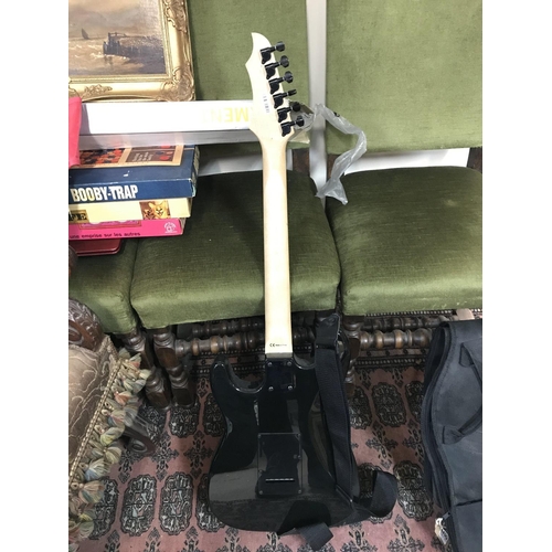 998 - Rocket special Stratocaster copy electric guitar with a black finish and hardware. Comes with a stra... 