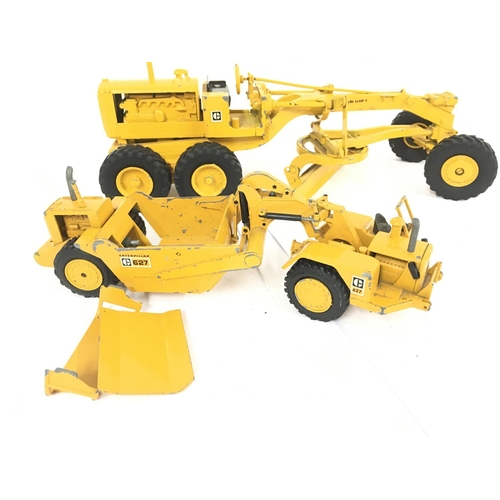 100 - 2 Die-Cast Construction vehicles. A NZG Cat 627 Scrapper and a Track Excavator.