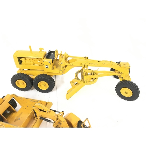 100 - 2 Die-Cast Construction vehicles. A NZG Cat 627 Scrapper and a Track Excavator.