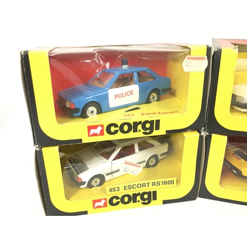 123 - 4 X Boxed Corgi Vehicles including Ford Escorts. Peugeot and Lotus.