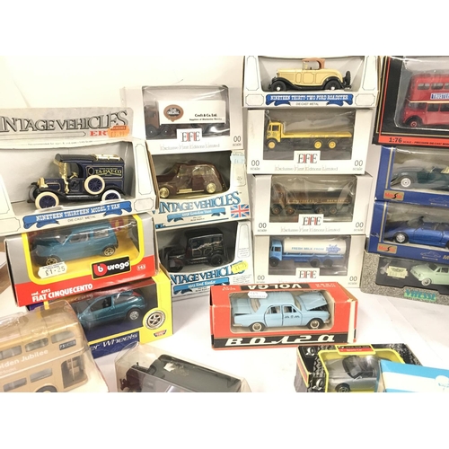 142 - A Collection of Various Boxed Die-Cast. Including Burago. EFE. Ertl.Maisto. Etc.