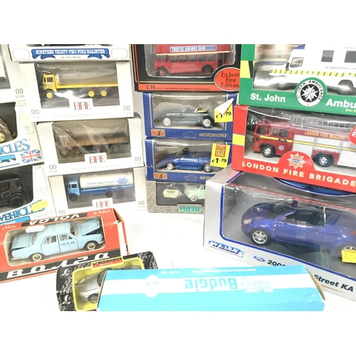 142 - A Collection of Various Boxed Die-Cast. Including Burago. EFE. Ertl.Maisto. Etc.