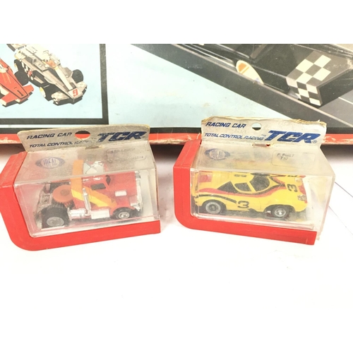 173 - A Boxed Ideal Games TCR Racing Set with 2 Extra Cars.(2).