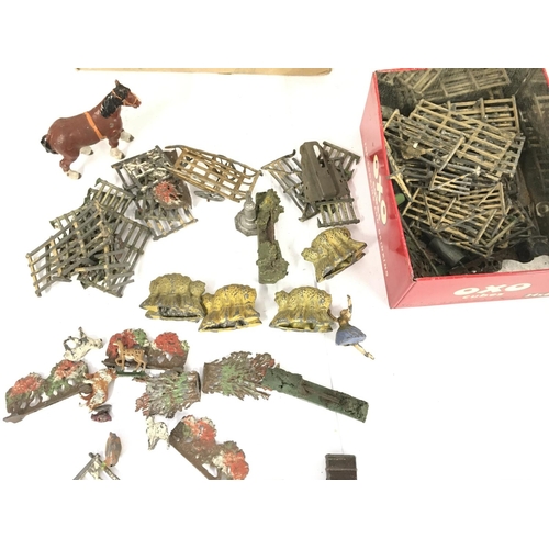 186 - A Box Containing Various Playworn Lead Soldiers. Aircraft. Farm Yard.