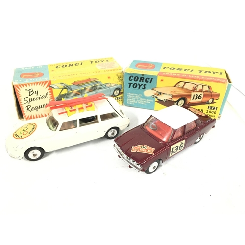 195 - A Boxed Corgi Citroen Safari #475 and a Rover 2000 #322. Boxes are worn.